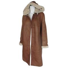hooded lambskin and shearling fur coat
