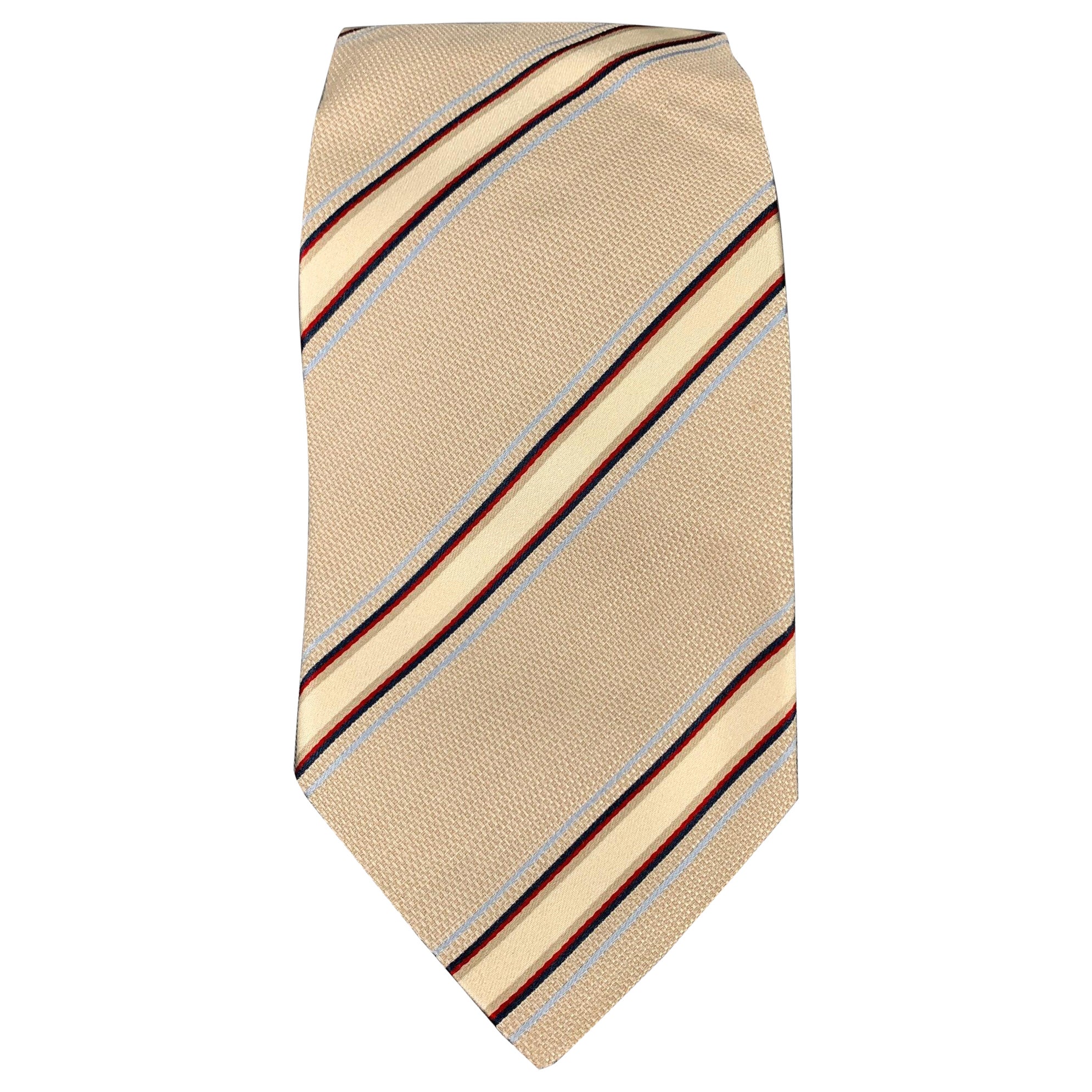 ERMENEGILDO ZEGNA Cravate en soie à rayures diagonales beige et bleu marine en vente