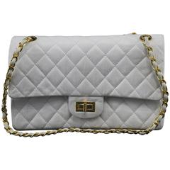 Vintage 80's Chanel 2.55 Bag in White Letaher and Golden Hardware. size 10"