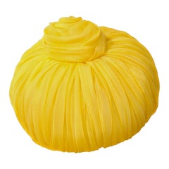 Christian Dior yellow pleated pillbox  style hat. C. 1960s