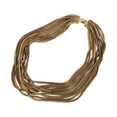 Elegant Gilt Snake Chain Draped Necklace