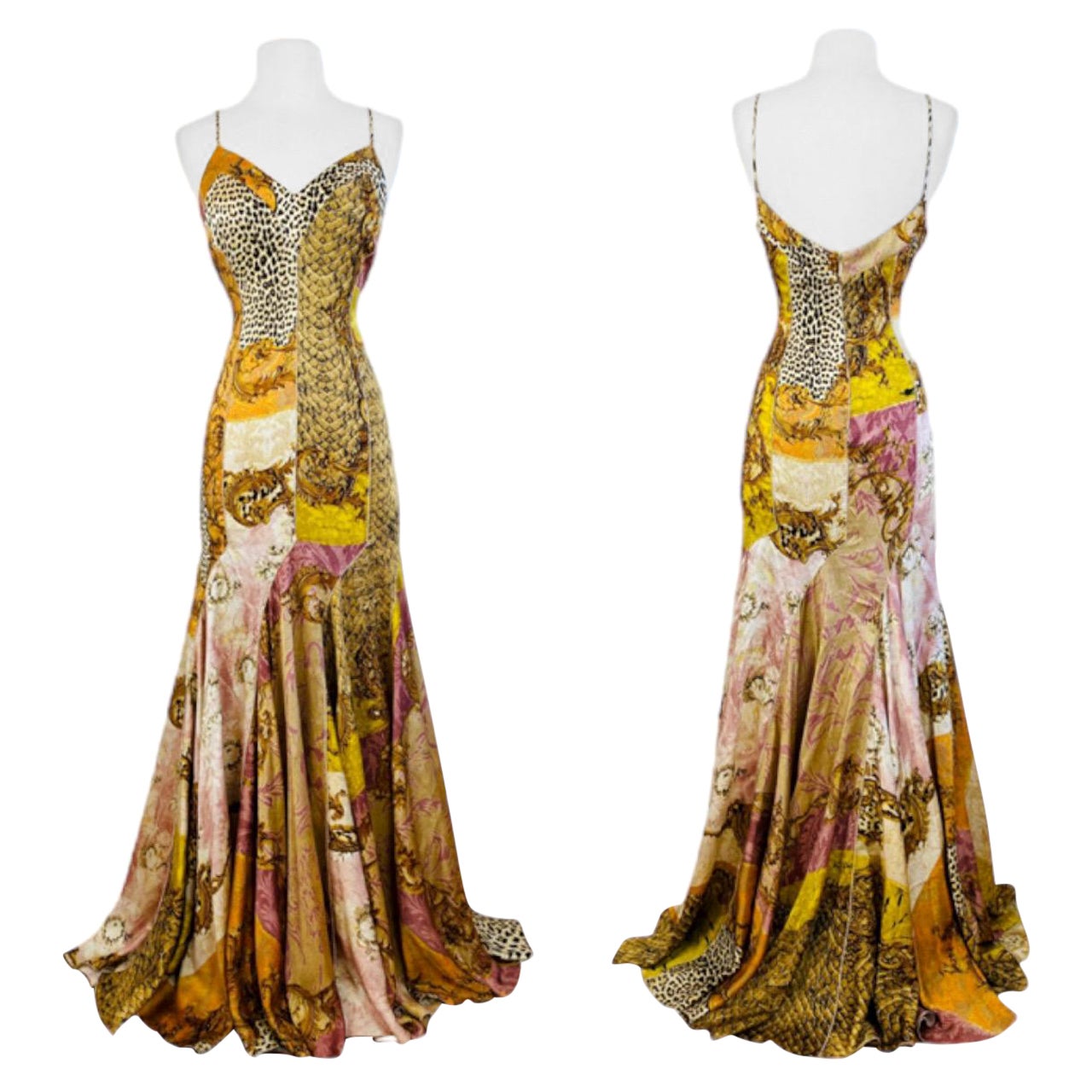 2004 Roberto Cavalli Dress (shown pinned)
Silk maxi length dress
Patchwork baroque, snake, python, cheetah, + leopard print fabric with gold accents throughout
Roberto Cavalli signature in various spot on dress
Thin shoulder straps
V neckline
Fitted