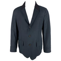 ALEXANDER MCQUEEN Manteau de sport hybride à col châle en laine bleu marine, taille 44