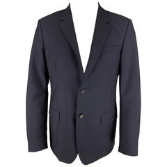 ALEXANDER MCQUEEN - Manteau de sport en laine et mohair bleu marine à revers clouté, taille 42
