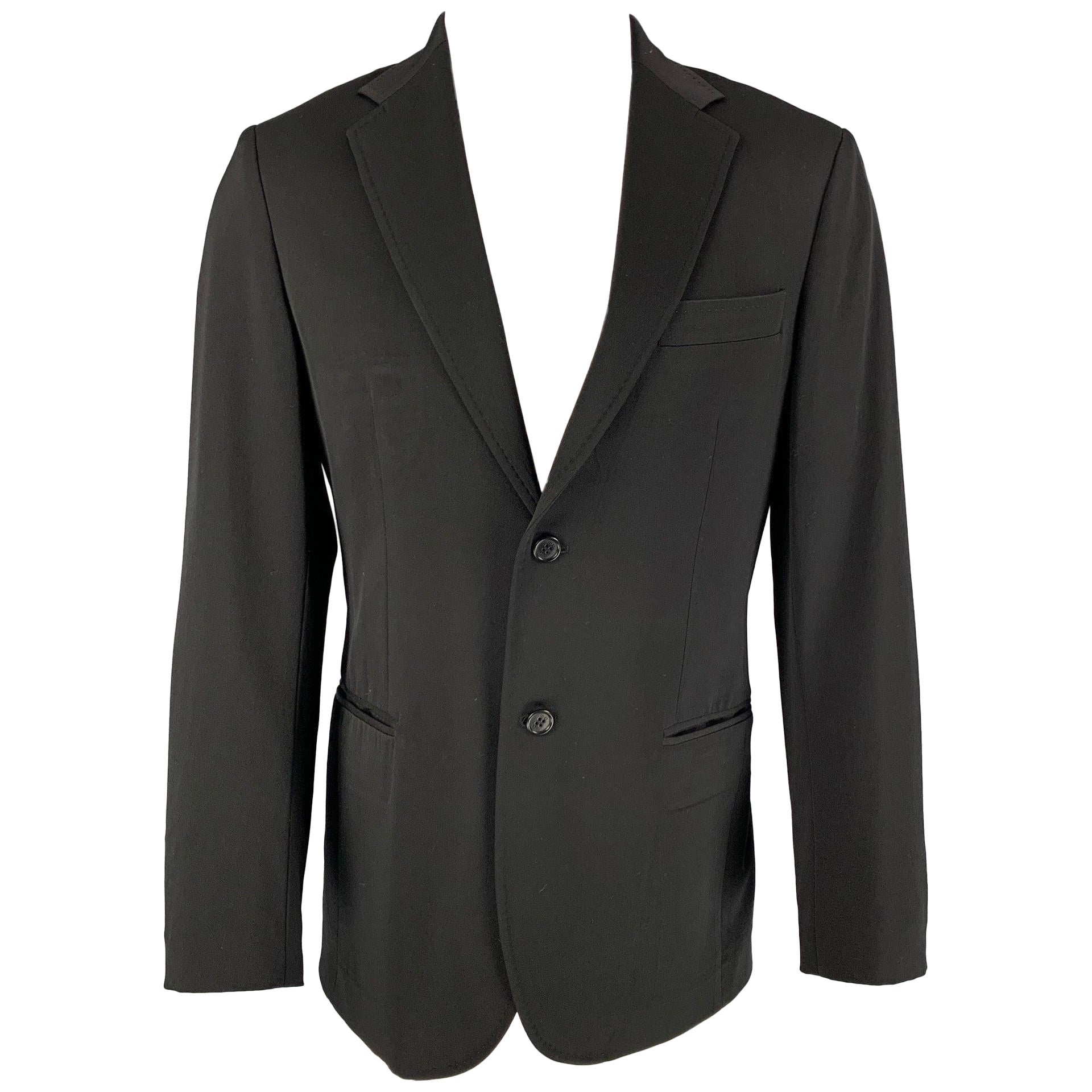 FENDI - Manteau de sport régulier en laine noire à revers clouté, taille 40 en vente