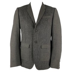 BURBERRY PRORSUM - Manteau de sport en laine vierge grise à revers clouté, taille 44