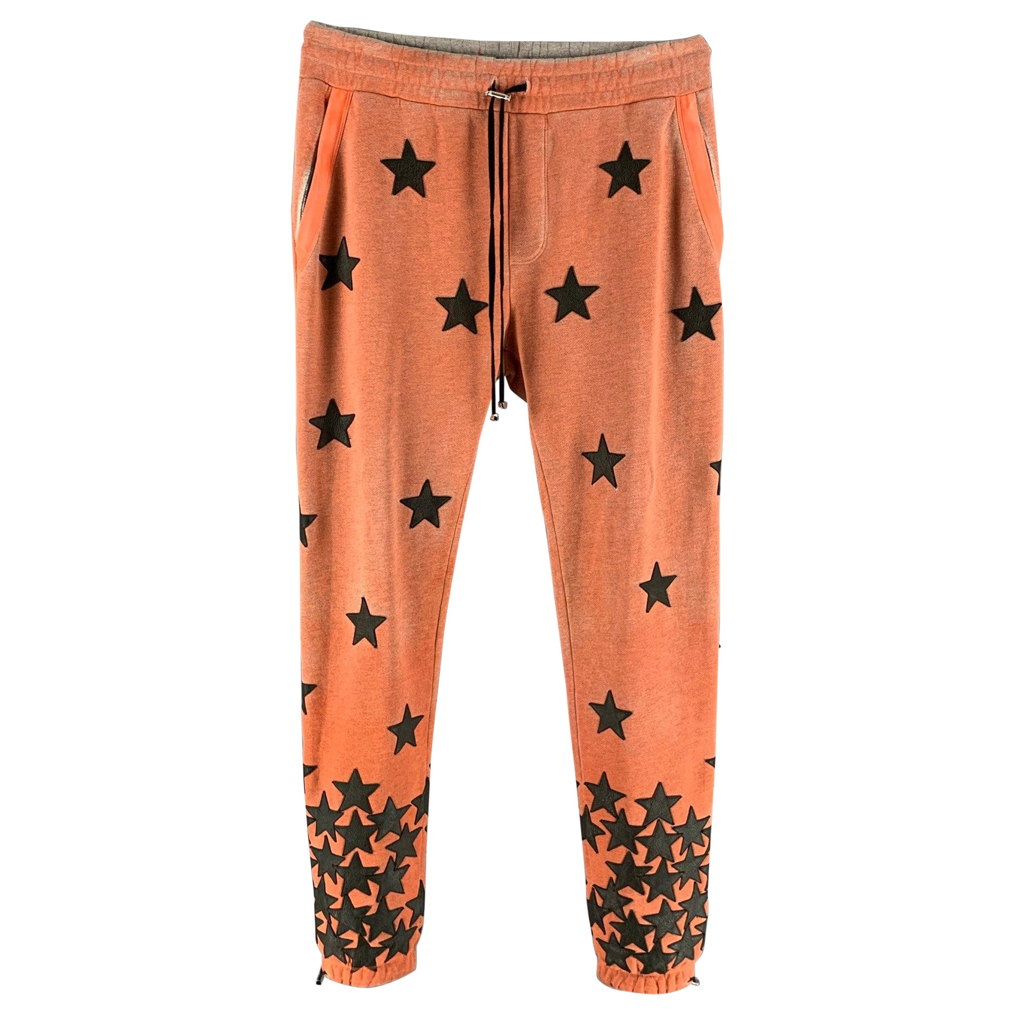 AMIRI Size L Orange Black Applique Stars  Cotton Sweatpants - Casual Pants For Sale