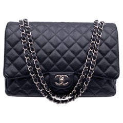 Used Chanel Black Quilted Caviar Maxi Timeless Classic 2.55 Double Flap Bag