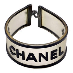 Chanel Vintage Clear and Black Rubber Logo Quatrefoil Bracelet