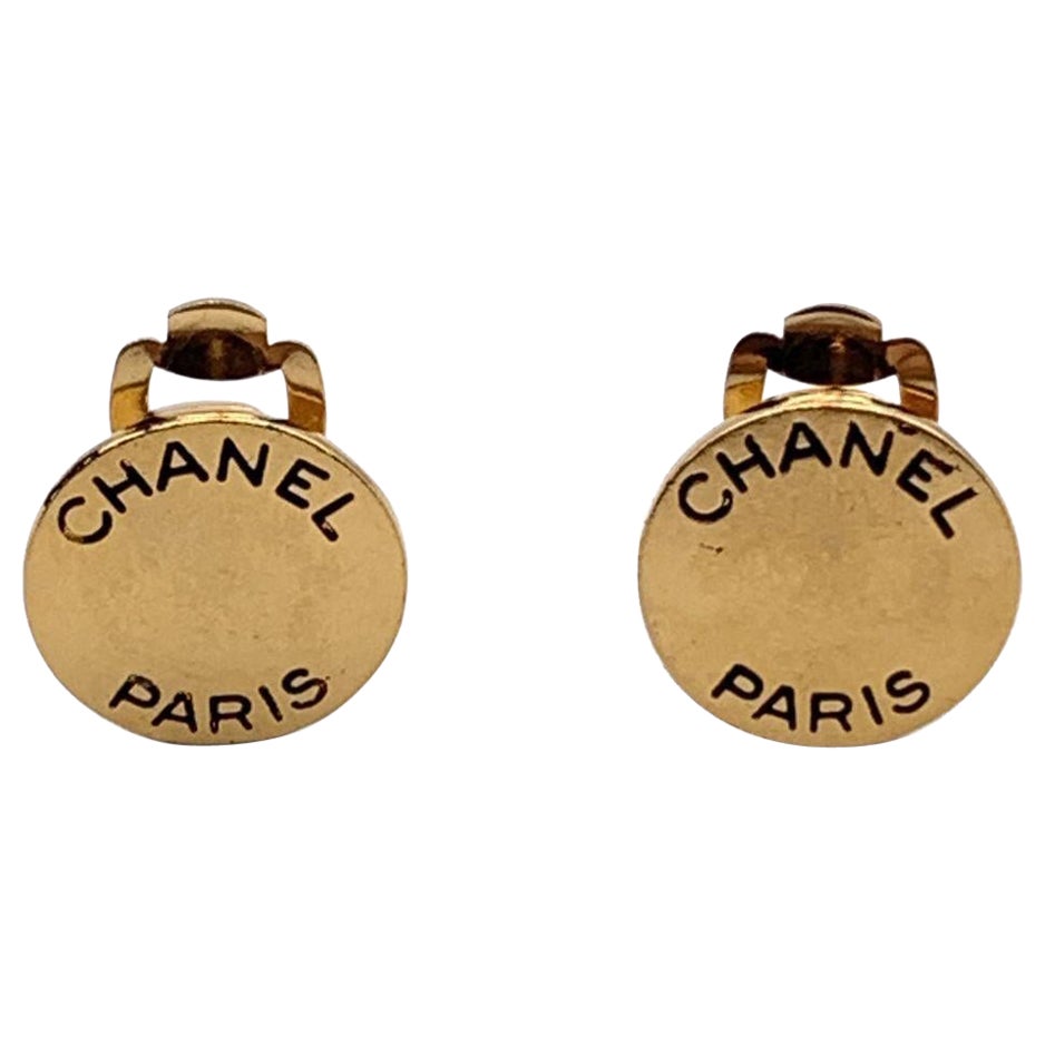 Chanel Paris Vintage Gold Metal Small Round Logo Clip On Earrings For Sale