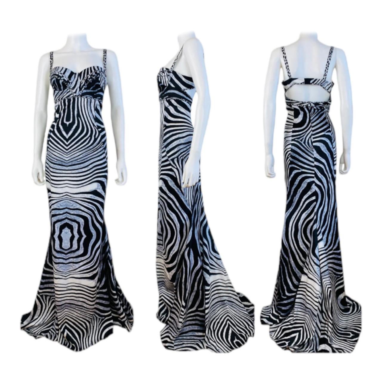 Fabulous Y2K Vintage Just Cavalli by Roberto Cavalli Dress (shown pinned)
Dramatic black + white zebra animal print
Bra bustier style bodice with fitted bust cups
Thin shoulder straps
Fitted wiggle style throughout
Cut out back with bra style