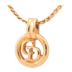 Christian Dior, collier rond avec logo CD