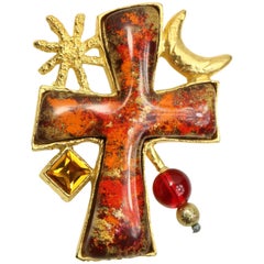 Retro Christian Lacroix Red/Orange Resin Inlaid Cross Gold Toned Sun and Moon Brooch