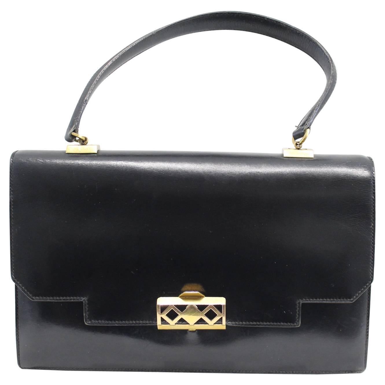 Hermes "Grille" Bag in black box leather, gold-plated hardware