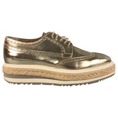 PRADA Size 6.5 Gold Leather Perforated Wingtip Lace Up Shoes