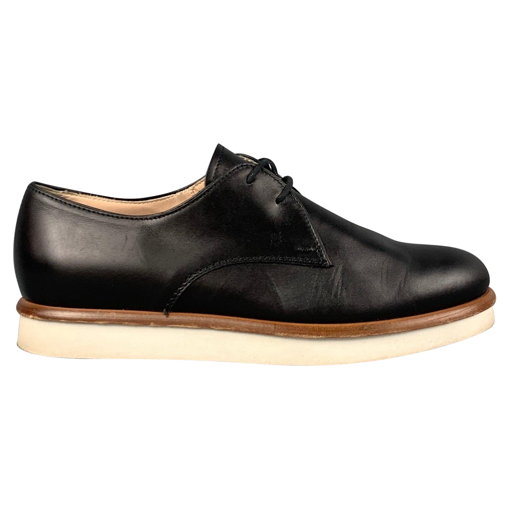 TOD'S Taille 6.5 Chaussures à lacets en cuir noir en vente
