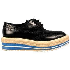 PRADA Size 6.5 Black White Blue Perforated Wingtip Shoes