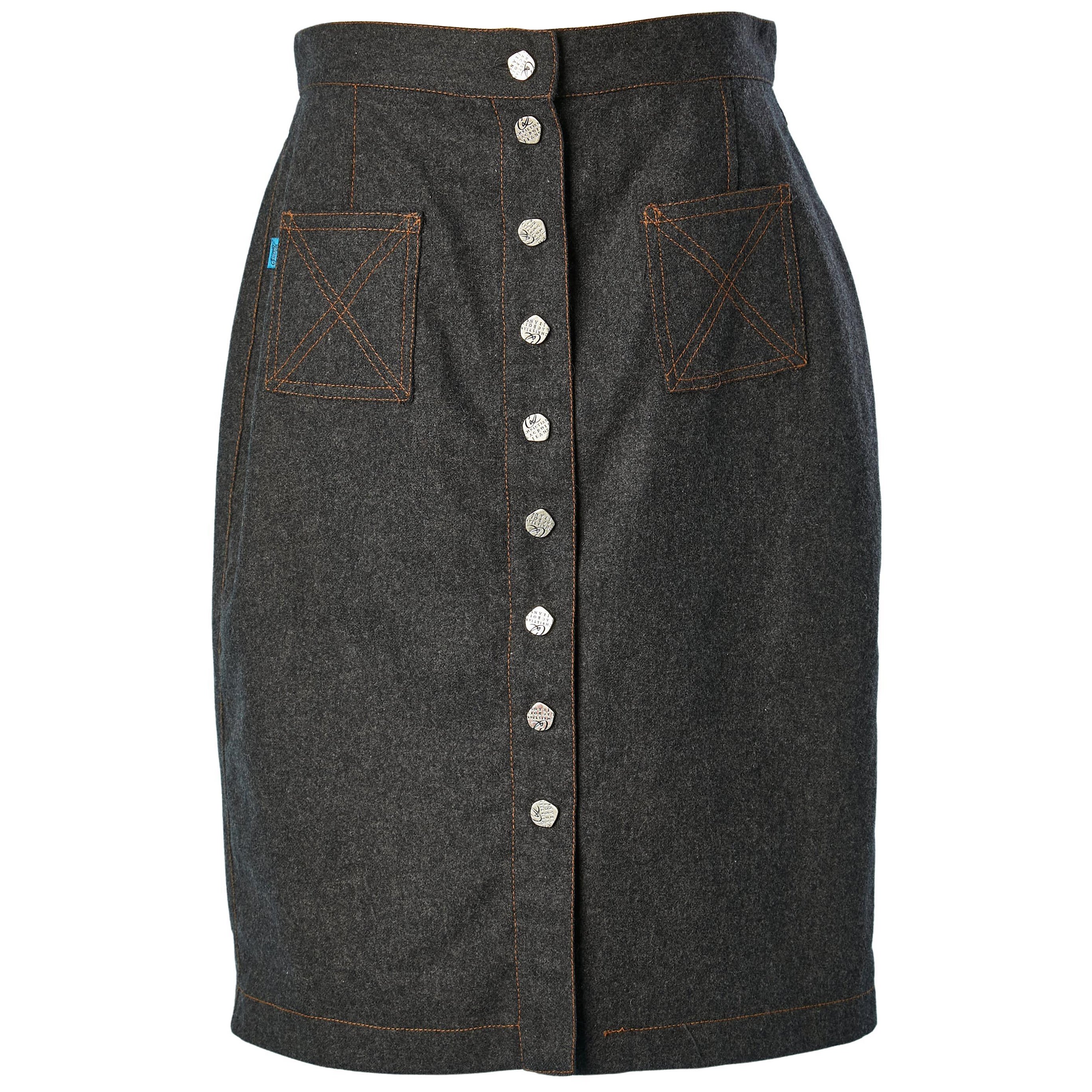 Grey flanelle skirt with snap closure middle front Jeans de Christian Lacroix  For Sale
