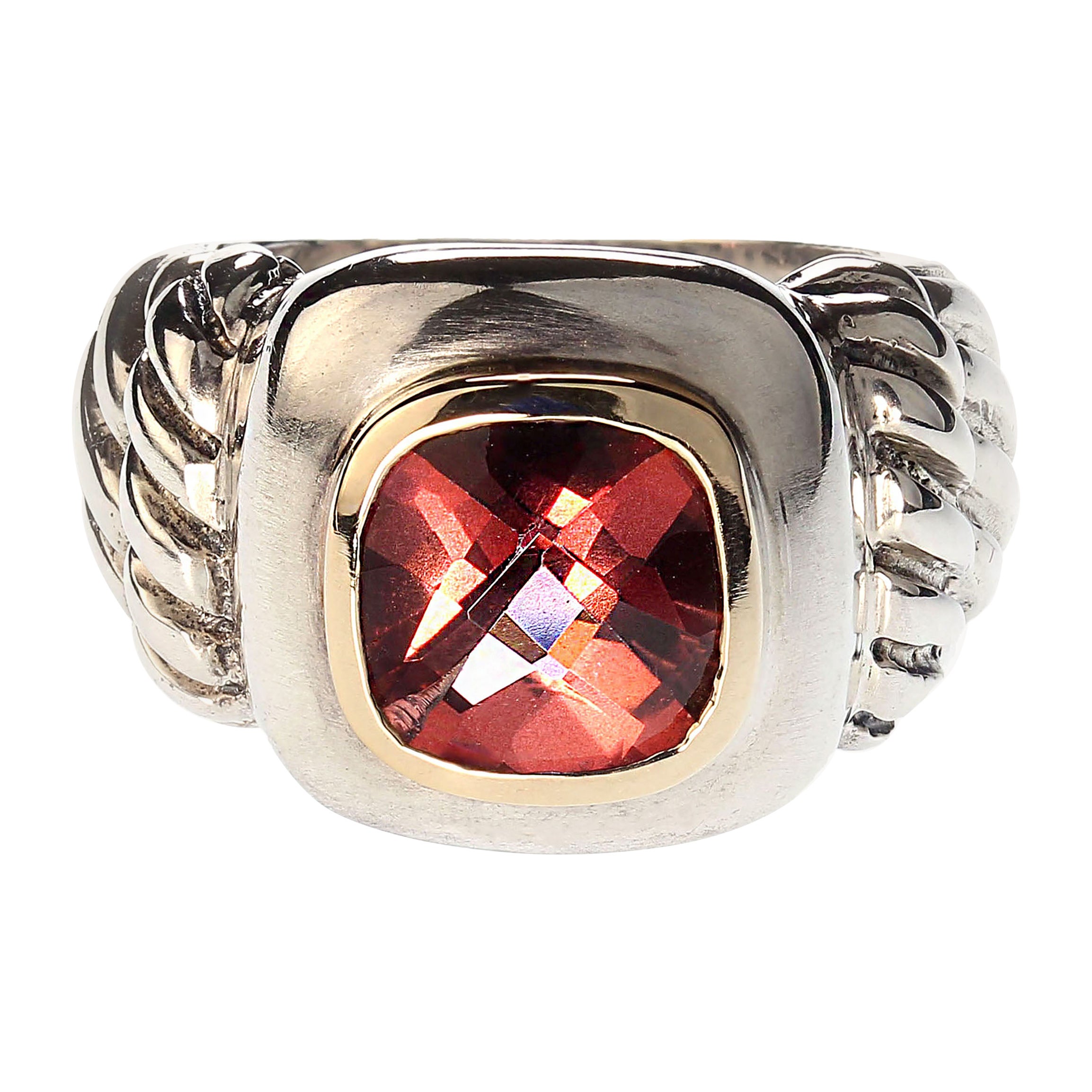AJD Striking Sterling Silver ring with 14K accents and pinkish red Topaz  