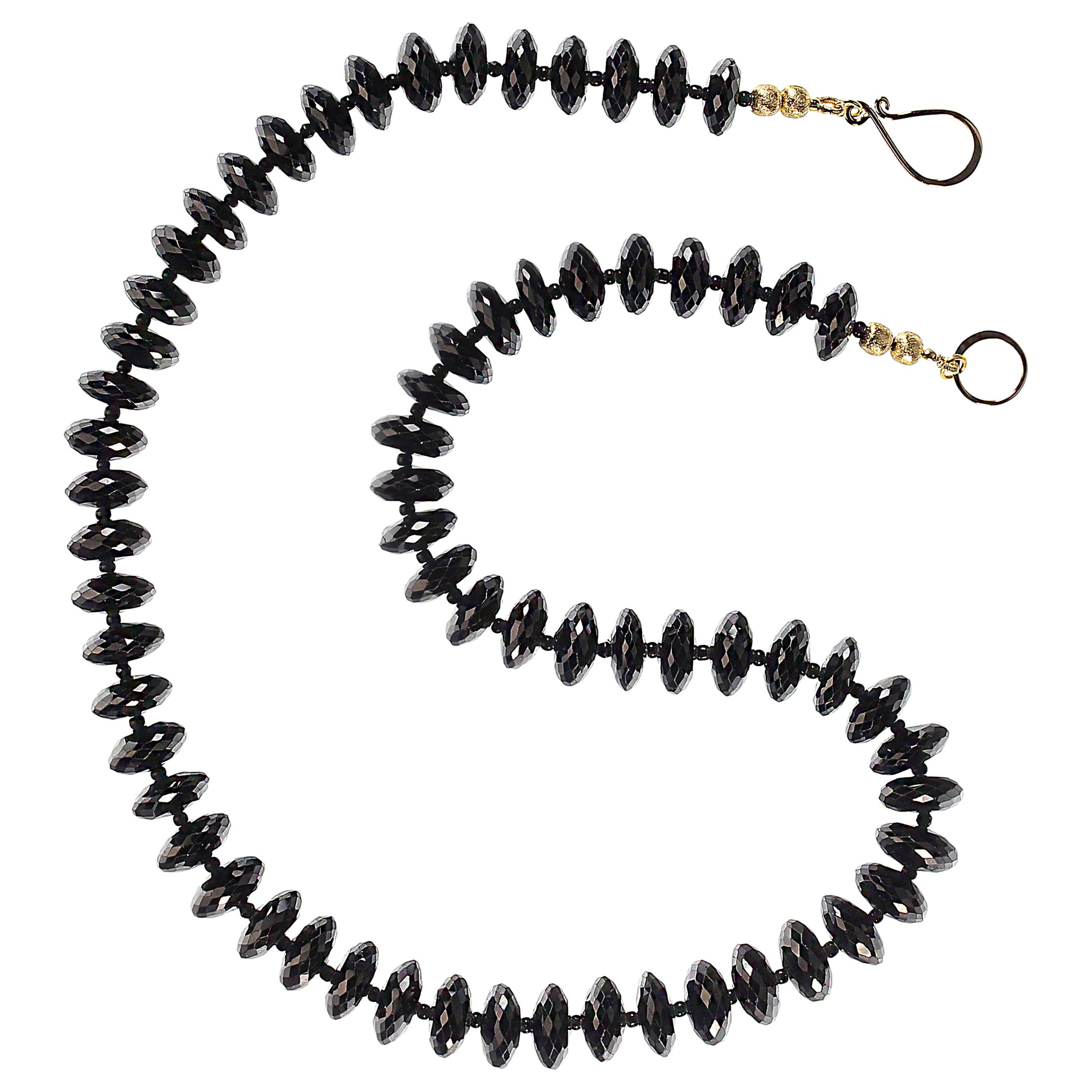 Fabulous black tourmaline rondelle necklace that is so sparkly is almost jumps off your neck!  This faceted black tourmaline necklace is just delightful and delicious.  You will love wearing this spectacular 18 inch necklace.  It is secured with a
