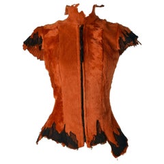 Orange furs vest with zip closure and topstitched on edge Oscar Carvallo 