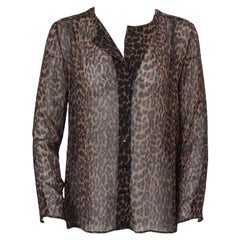 Saint Laurent Top in seta trasparente con bottoni leopardati