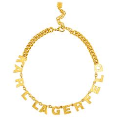 Vintage Karl Lagerfeld Gold Tone Block Letter Charm Curb Chain Link Necklace