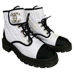 Used Chanel quilted black and white Boots