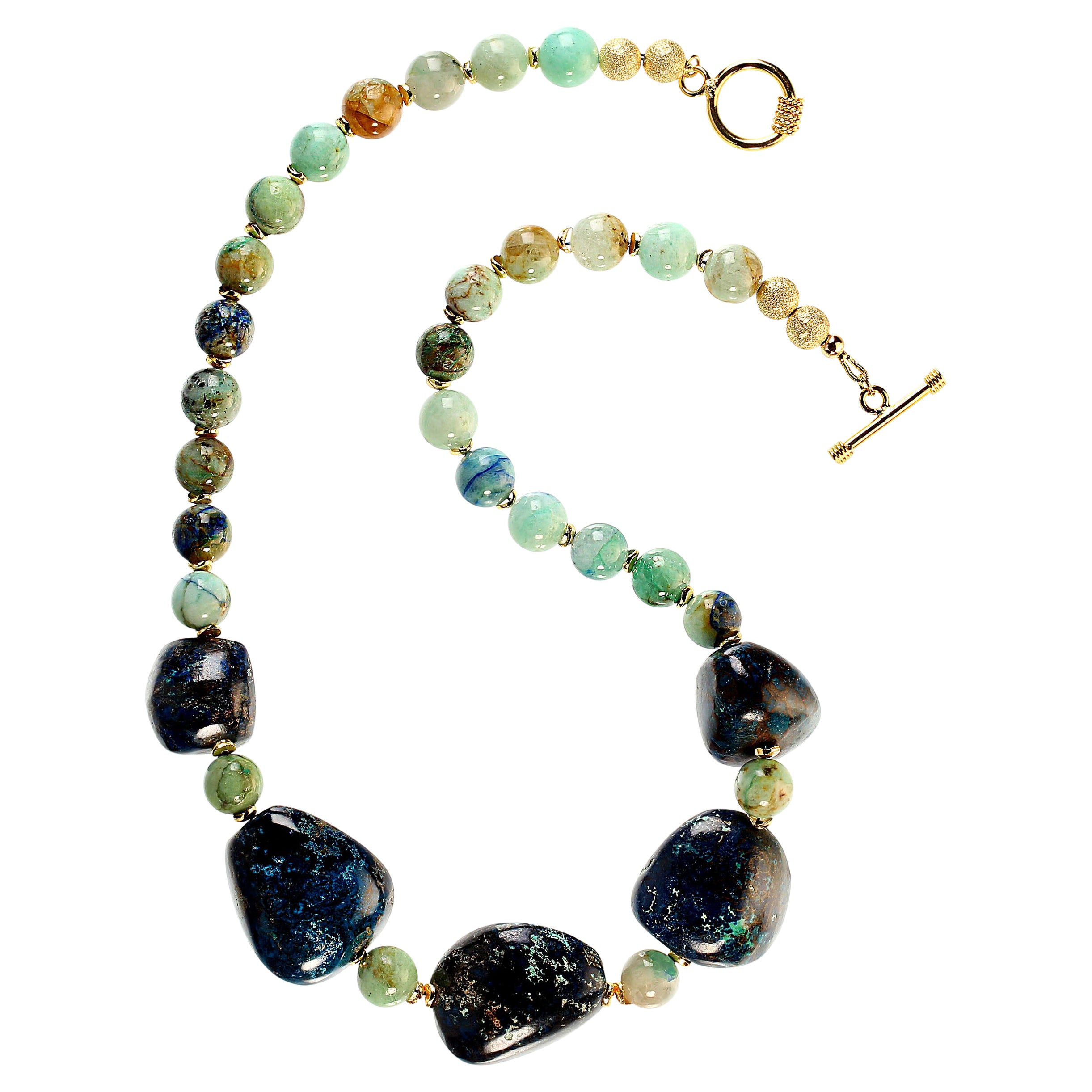 19.5 Inch Chrysocolla necklace with five gorgeous large smooth blue nuggets and greenish round beads all accented with goldy flutters.  This delightful and oh so wearable necklace is secured with a gold plate toggle clasp.  MN2425