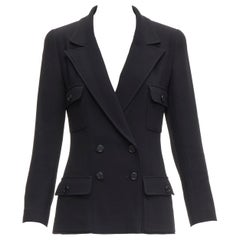 CHANEL Petite veste noire vintage en crêpe de laine avec doublure de soie et boutons CC