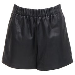 TIBI Schwarze Mini Shorts aus elastischem Vegan-Leder mit Tasche in der Taille XS