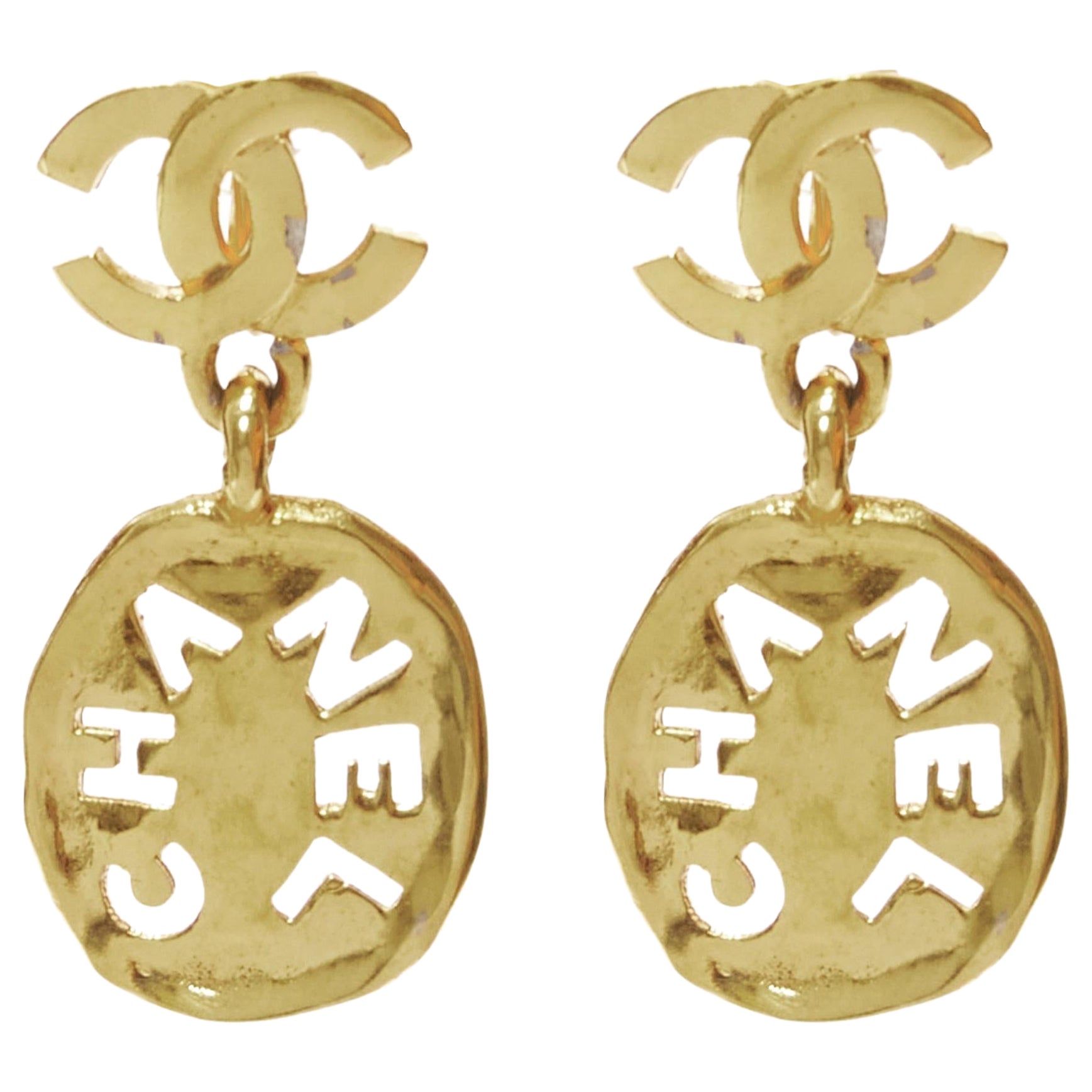 rare CHANEL Vintage gold CC logo cut out hammered coin clip on earrings For Sale