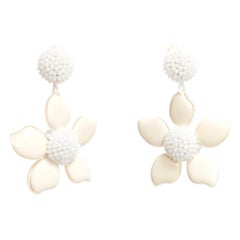 OSCAR DE LA RENTA cream beaded acrylic flower statement clip on earrings pair