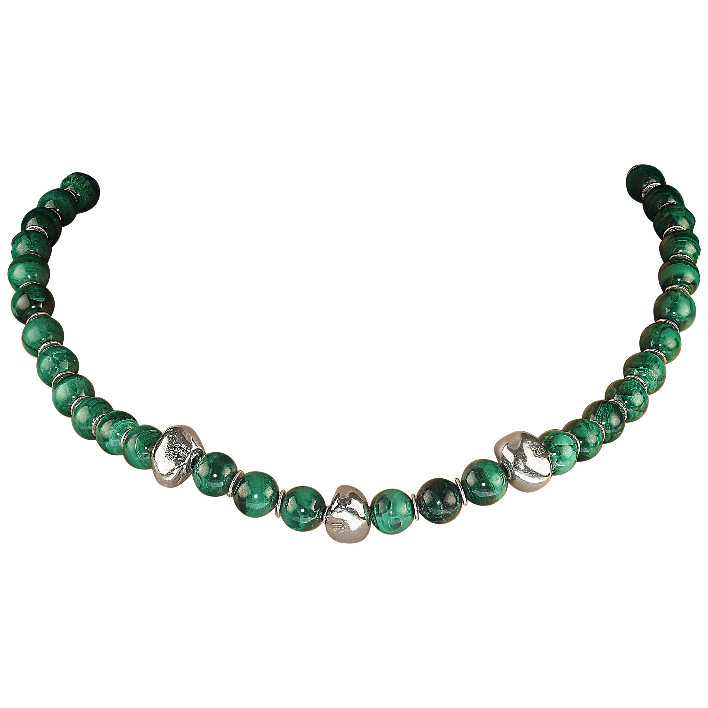Gorgeous malachite necklace with three sterling silver focals across the center front.  These pebble like shiny sterling silver focals are somewhat larger than the 10 mm malachite beads so they really set off the front of the necklace.  The remainer
