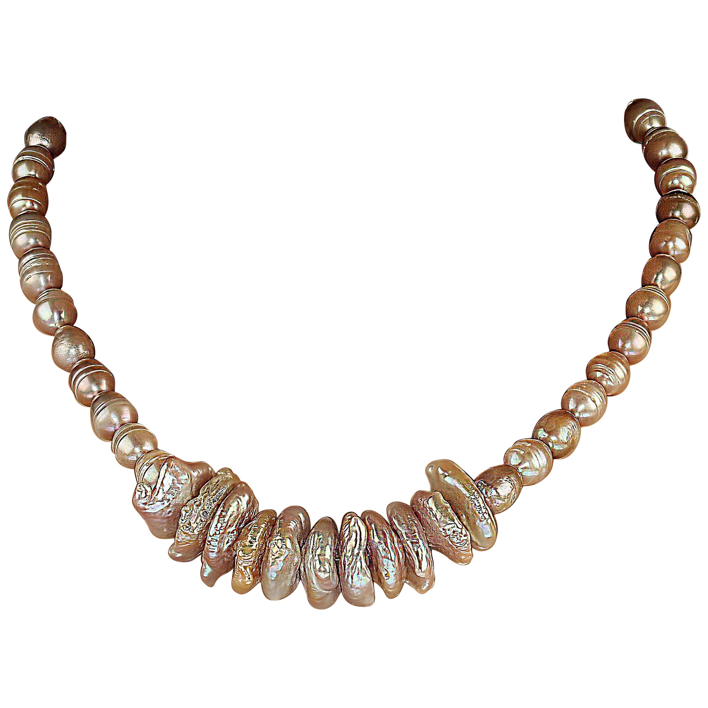 18-Inch elegant pearl necklace of mauvy/pink potato pearls with three inches of center drilled coin pearls across the center front of the necklace. This is the perfect necklace for day and evening wear.  It features an easy to use 'S' clasp.  MN2437