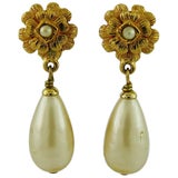 Chanel Vintage Classic Camellia Pearl Drop Clip-On Earrings at 1stDibs   vintage pearl drop earrings, clip on pearl drop earrings, chanel earrings  camellia