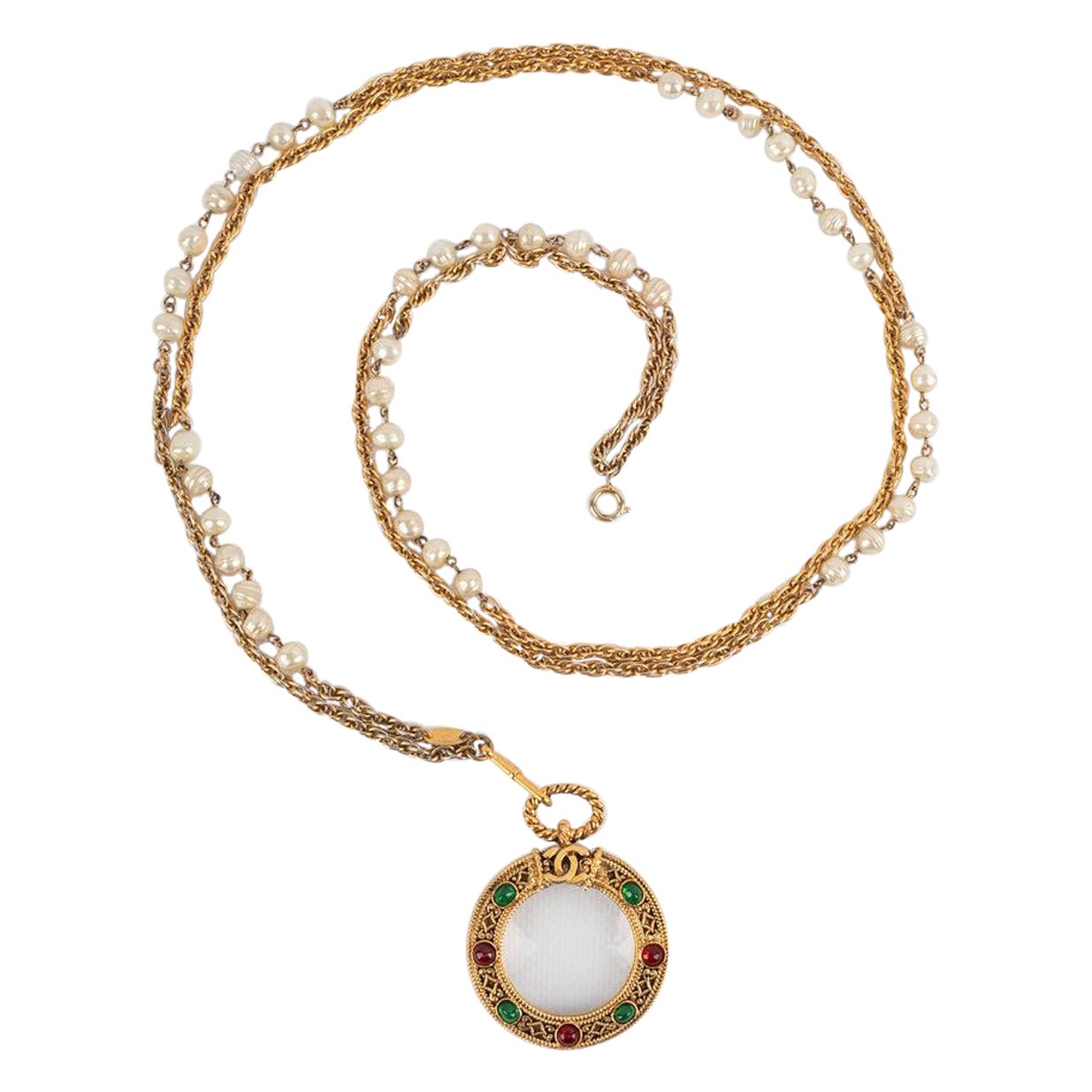 Chanel, collier en métal doré en verre grossissant, 1985 en vente