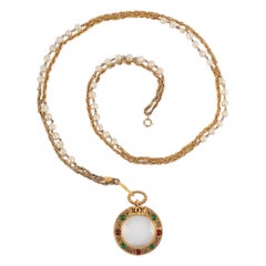 Chanel, collier en métal doré en verre grossissant, 1985