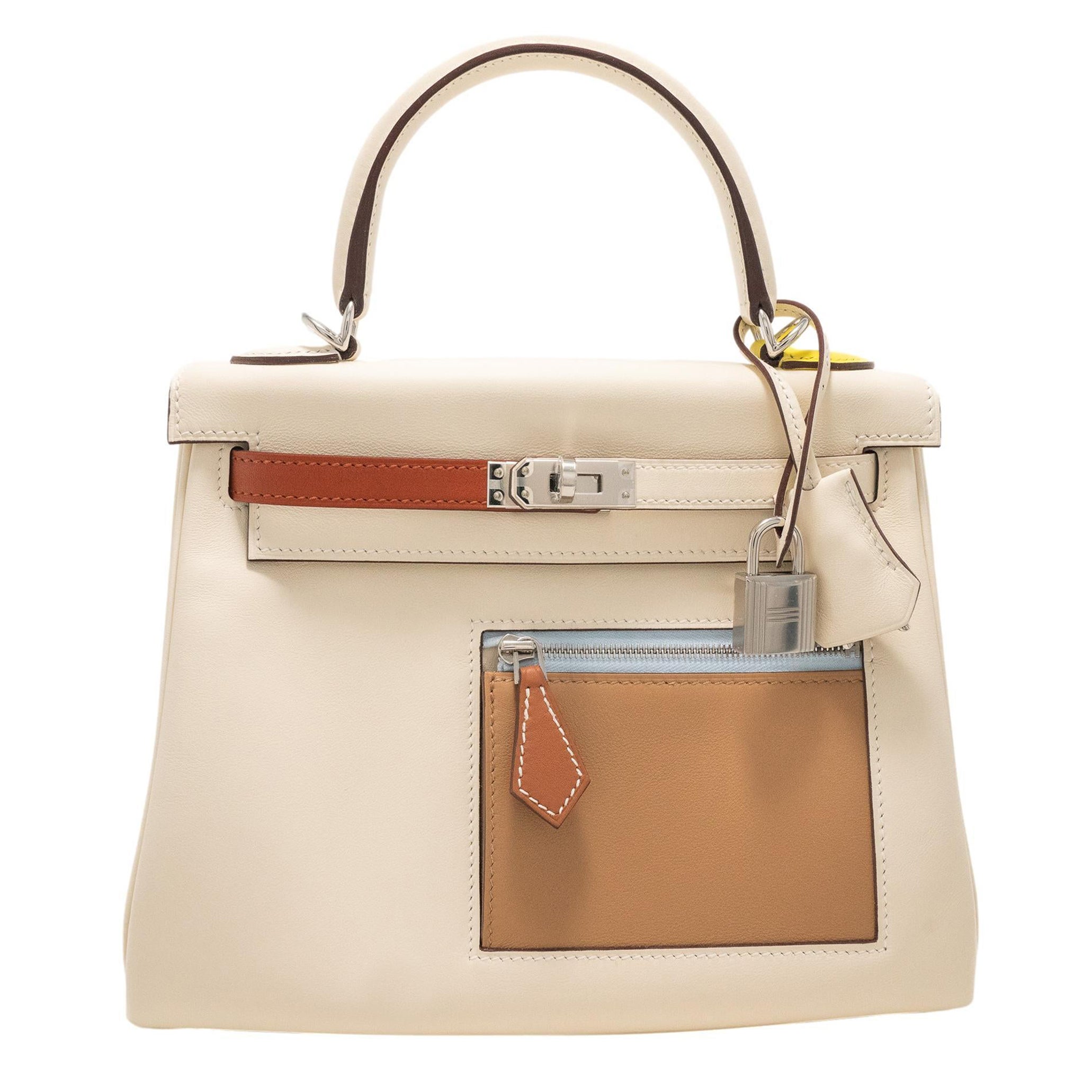 HERMES Kelly 25 Retourne Colormatic "Nata" Swift Leather PHW Limited Edition  en vente