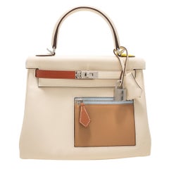 HERMES Kelly 25 Retourne Colormatic "Nata" Swift Leather PHW Limited Edition 