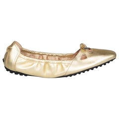 Tod's Chaussures de conduite à découpes en cuir doré taille IT 37,5