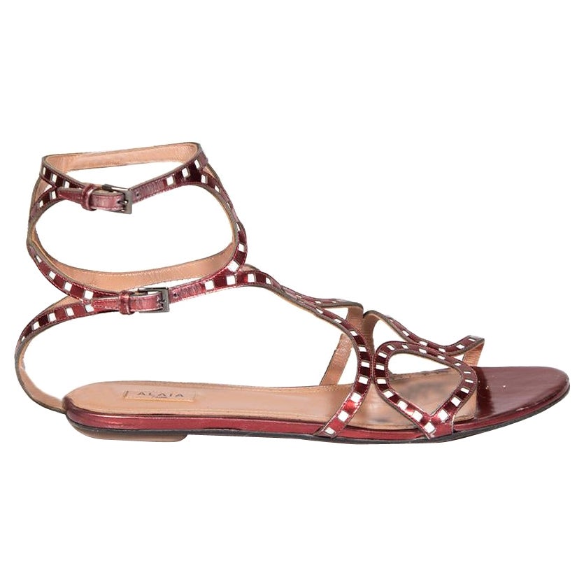 Alaïa Metallic Red Leather Laser Cut Gladiator Sandals Size IT 39.5 For Sale