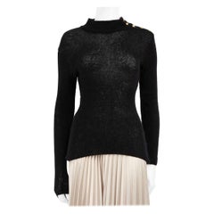 Balmain Schwarzer Pullover aus Wolle mit Knopfleiste Größe M