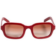 Lunettes de soleil teintées à monture carrée rouge de Prada