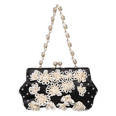 Valentino Garavani Mini bag vintage in raso nero con decorazioni floreali