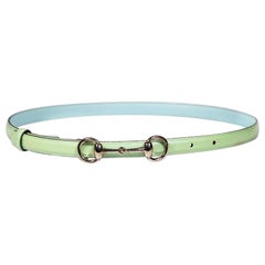 Cinturón de piel de caballo de charol verde Gucci