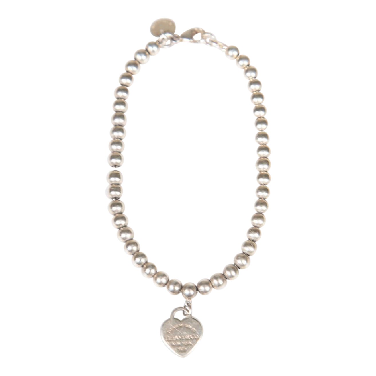 Bracelet de perles Tiffany & Co retour à Tiffany