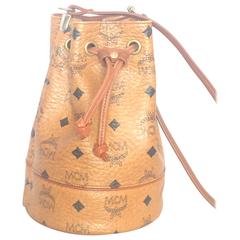 Vintage MCM brown monogram small hobo bucket bag. mini purse. So chic and cute.