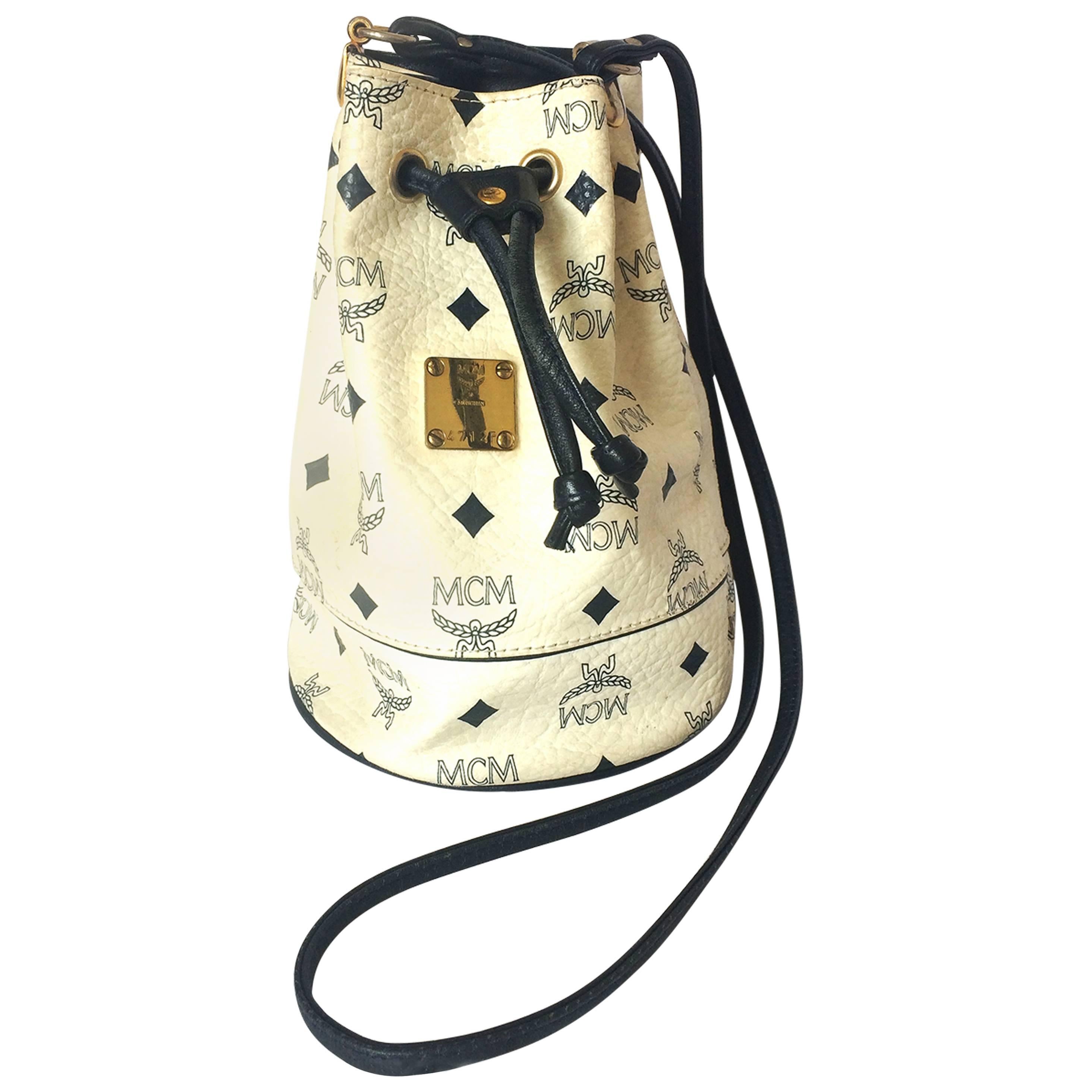 Vintage MCM white and navy monogram small hobo bucket bag. So chic and cute.