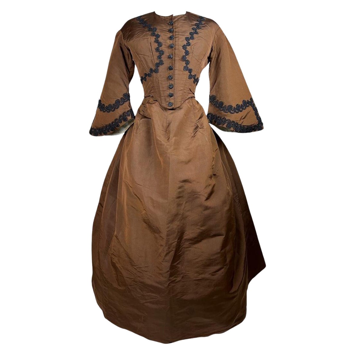 A brown silk faille day dress with pagoda sleeves - France Circa 1880 For Sale